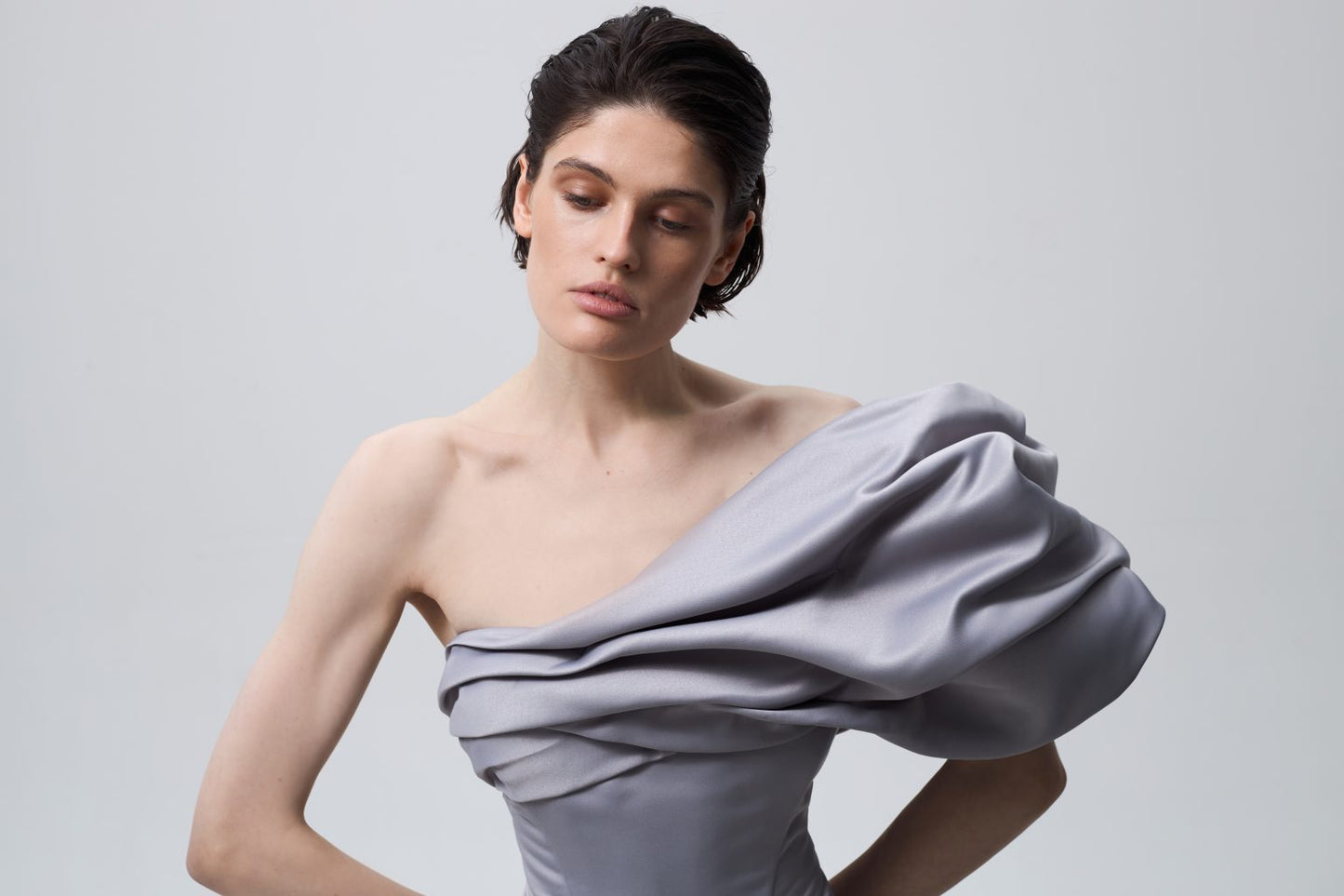 Asymmetrical corset with flounces