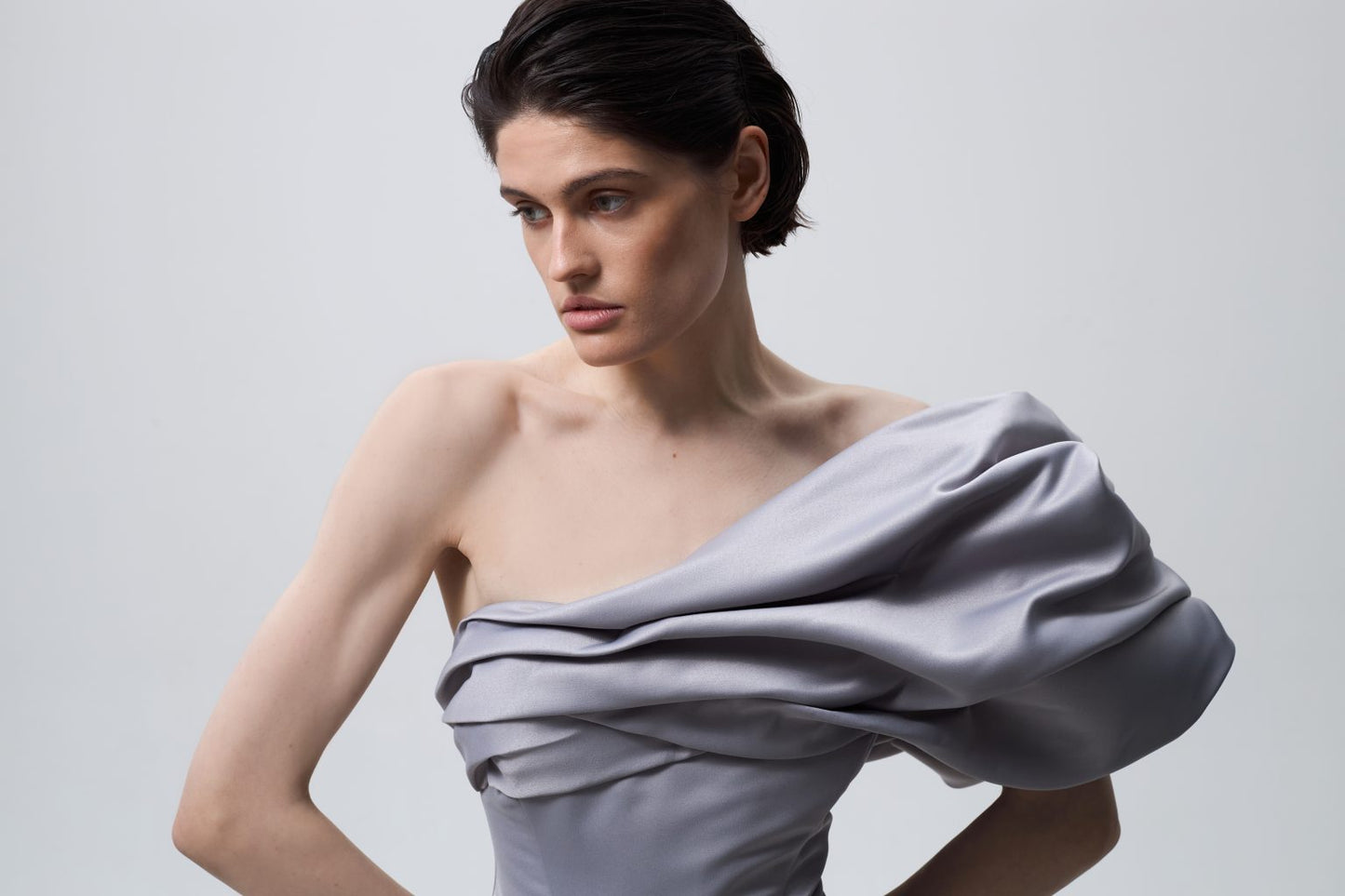 Asymmetrical corset with flounces