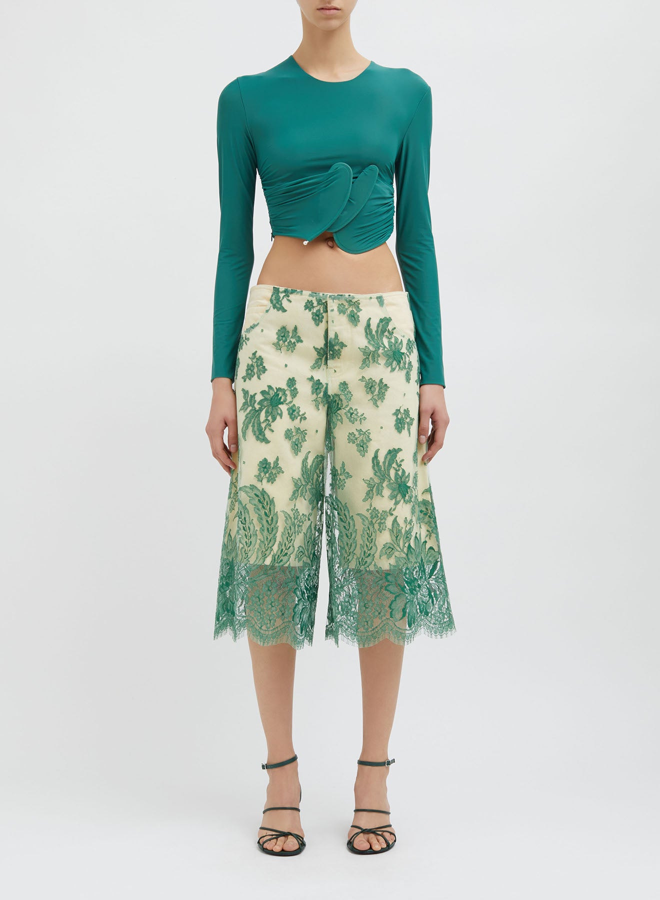 ENCOMPASSED LOOPED CROP TOP