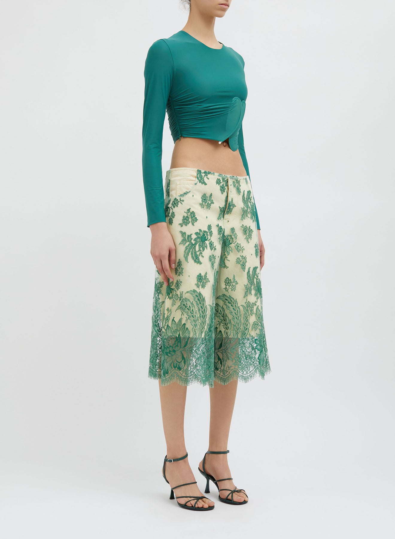 ENCOMPASSED LOOPED CROP TOP