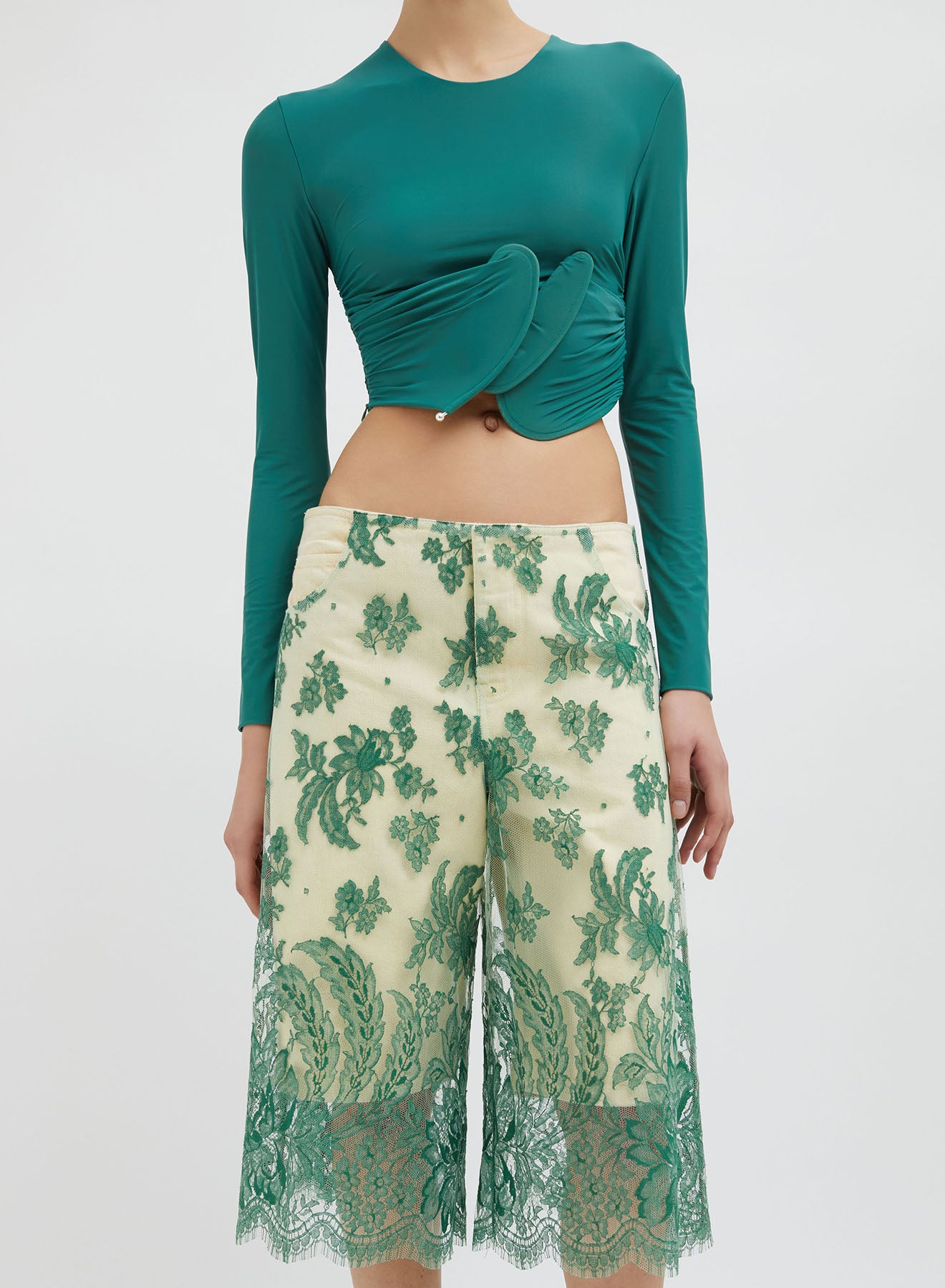 ENCOMPASSED LOOPED CROP TOP