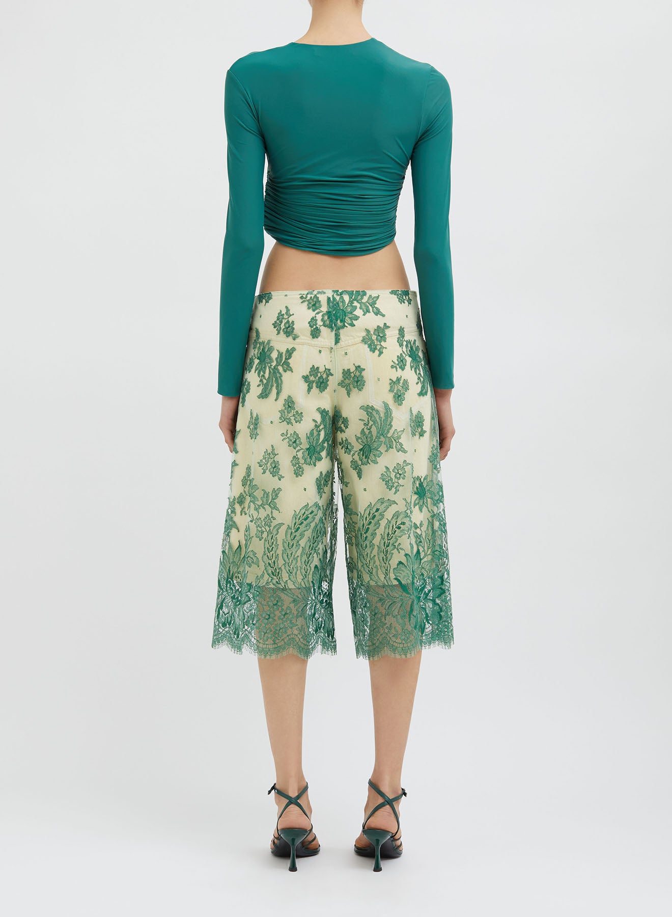 ENCOMPASSED LOOPED CROP TOP