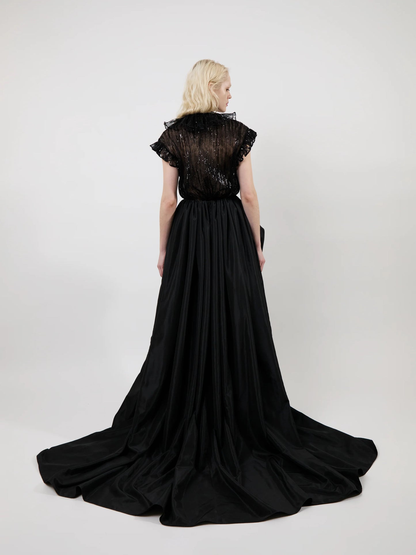 THE ESTE RUFFLE TOP IN BLACK
