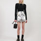 THE CHERRY SKIRT IN METALLIC SILVER