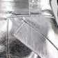 THE CHERRY SKIRT IN METALLIC SILVER