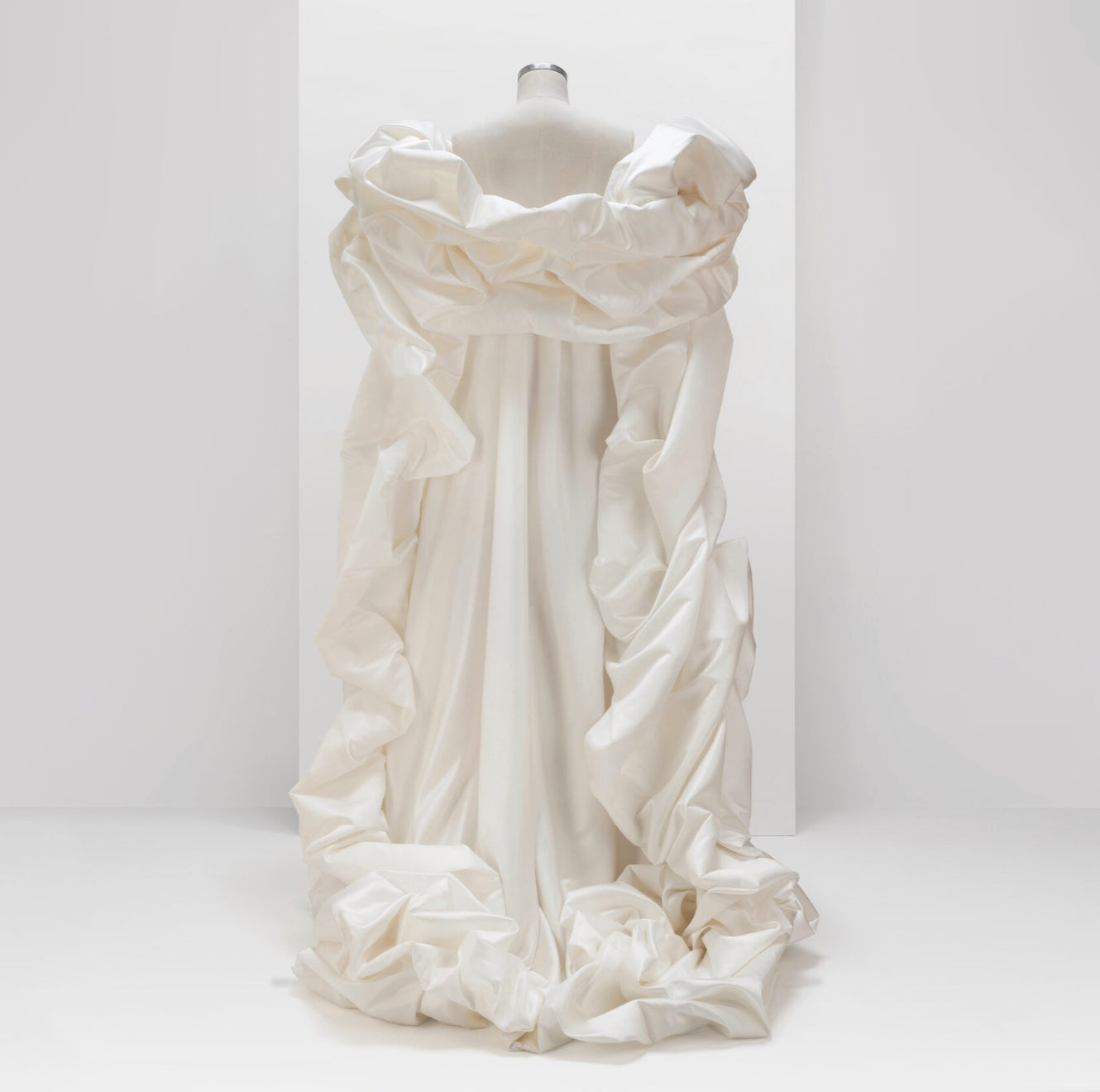 SCULPTURAL CORSET DRESS WITH CAPE