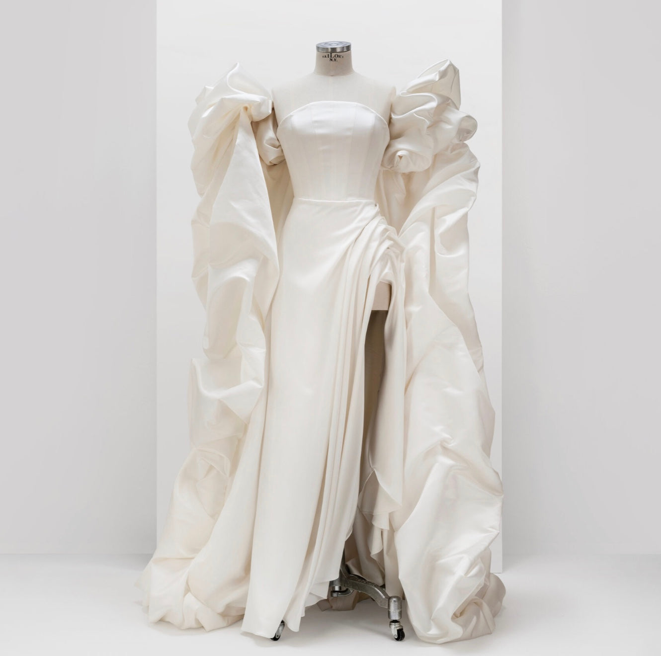 SCULPTURAL CORSET DRESS WITH CAPE