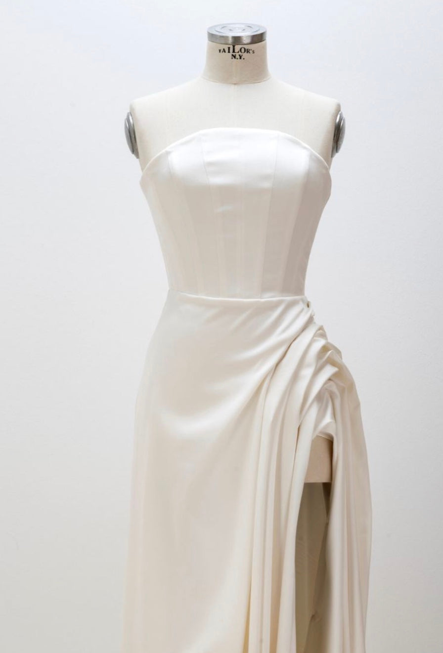 SCULPTURAL CORSET DRESS WITH CAPE