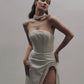 SCULPTURAL CORSET DRESS WITH CAPE