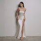 SCULPTURAL CORSET DRESS WITH CAPE