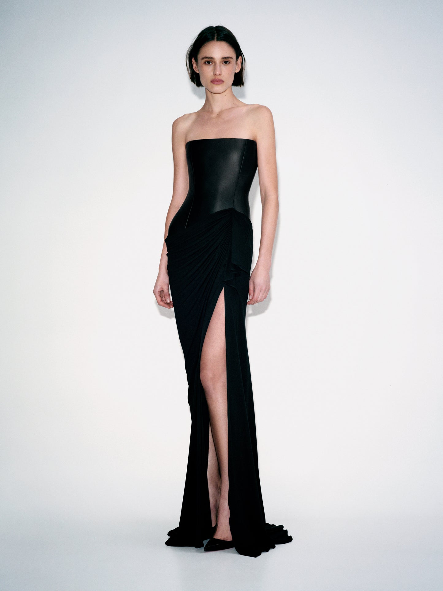STRAPLESS LONGLINE ASYMMETRIC GOWN IN LEATHER & DRY JERSEY
