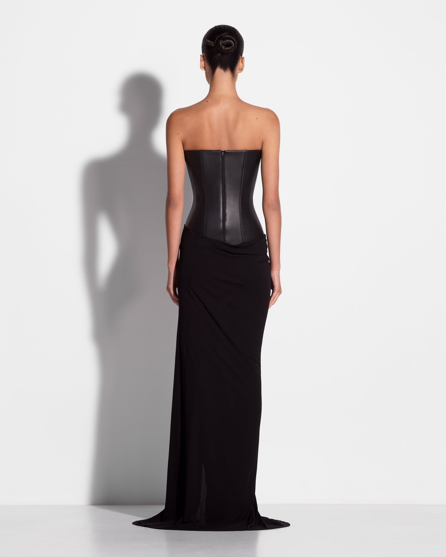 STRAPLESS LONGLINE ASYMMETRIC GOWN IN LEATHER & DRY JERSEY