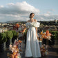 CORSET DRESS WITH MERINGUE FLOUNCES