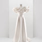 CORSET DRESS WITH MERINGUE FLOUNCES
