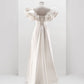 CORSET DRESS WITH MERINGUE FLOUNCES