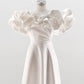 CORSET DRESS WITH MERINGUE FLOUNCES