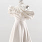 CORSET DRESS WITH MERINGUE FLOUNCES